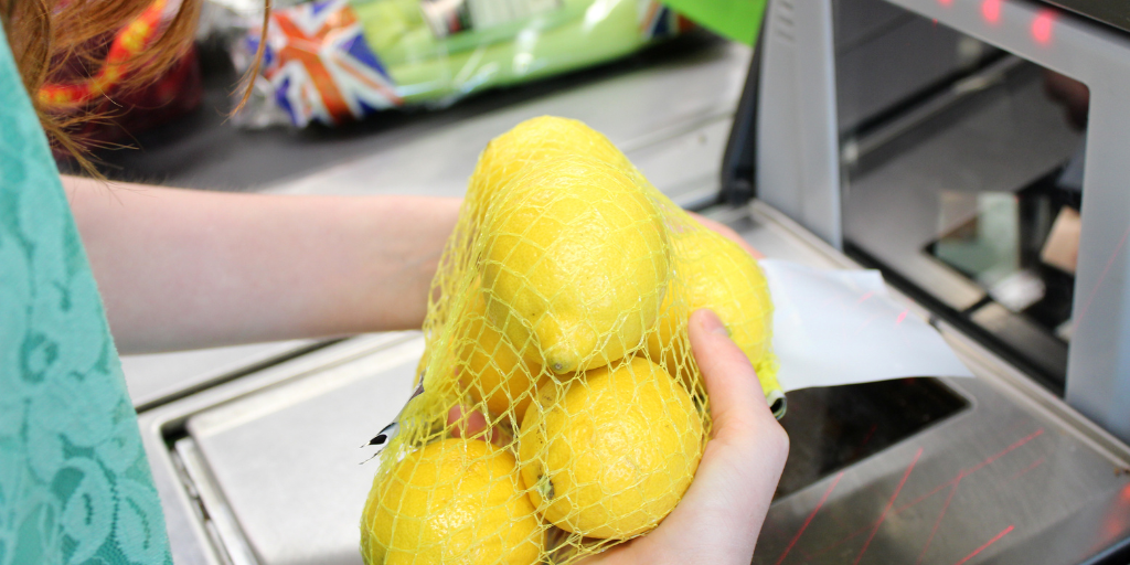 Lemons being scanned at a self-service supermarket checkout